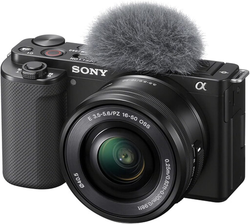 Sony ZV-E10 Mirrorless Camera with 16-50mm Lens, 128GB Extreem Speed Memory,.43 Wide Angle  2X Lenses, Case. Tripod, Filters, Hood, Grip,Spare Battery  Charger, Editing Software Kit -Deluxe Bundle